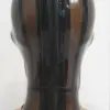 Close up of translucent black latex hood showing see through effect