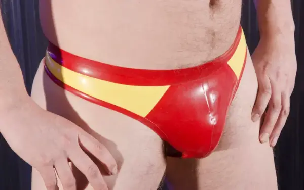 Men's Latex Thong with Contrast Panels in red and yellow front view
