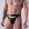 Close up of yellow horizontal fly on black latex underwear