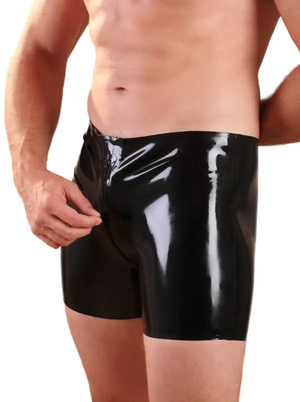 Close up of black latex shorts with structured seams and zipper