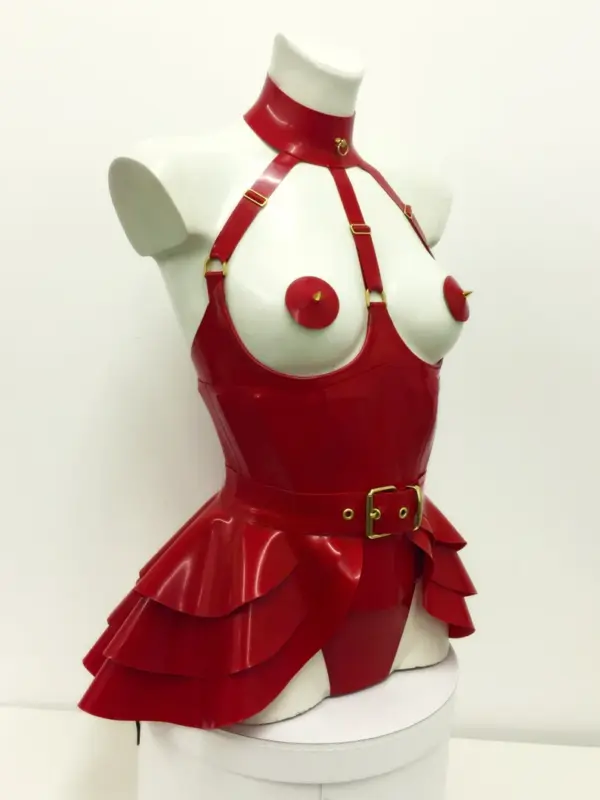 Woman wearing sci-fi style latex harness bra set