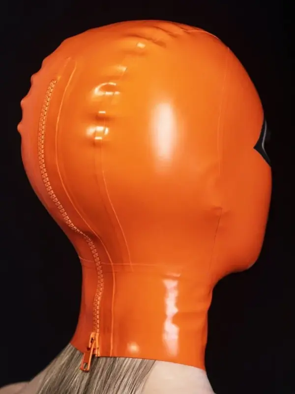 Side view of vibrant orange rubber fox mask with back zipper