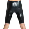 Sleek black fetish shorts worn by male model