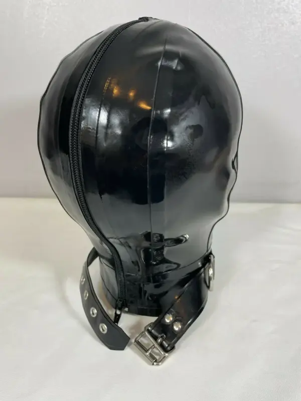 Rear view of black latex hood with zipper and integrated collar