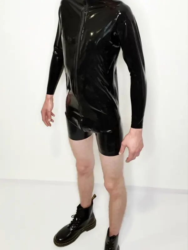 Long sleeve latex top worn with shorts by male model