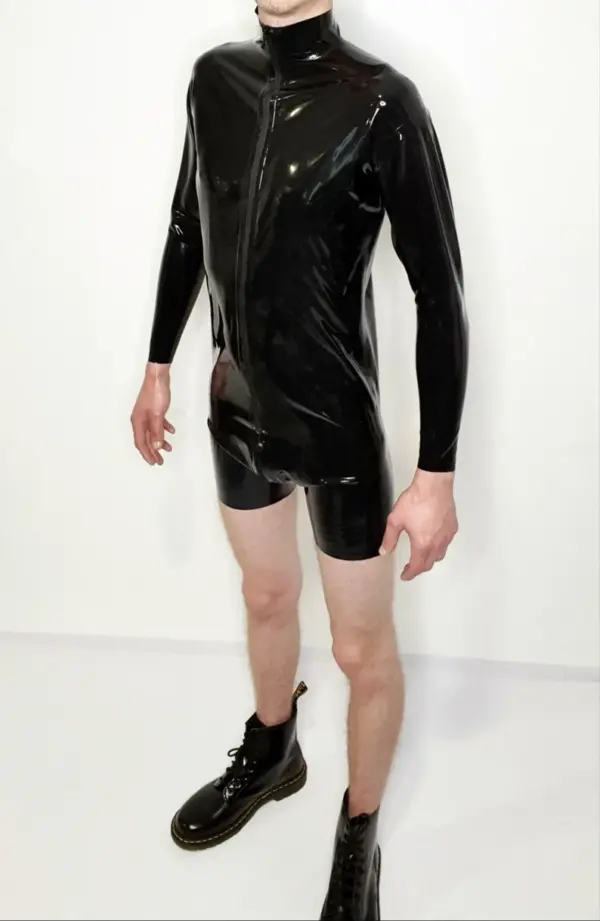 Long sleeve latex top worn with shorts by male model