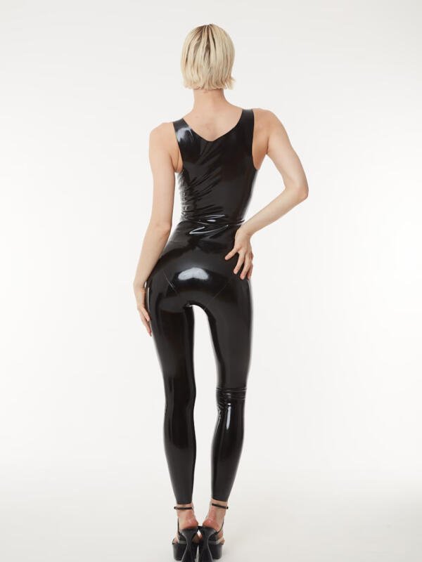 Back view of women's latex catsuit showing open shoulder blade design and sleek fit