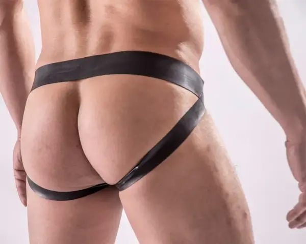 Rear view of open back latex jockstrap shorts for men