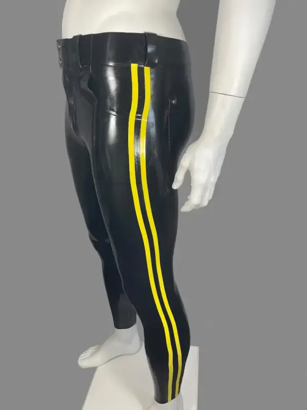 Close up of pockets and waistband on black rubber trousers