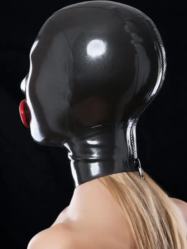 Side view of sensory deprivation rubber mask with large red mouth gag