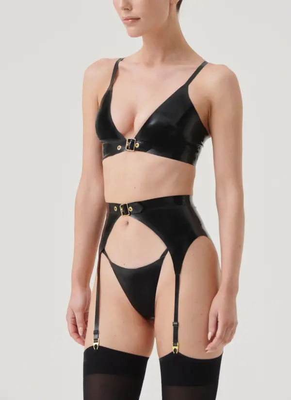 Woman wearing luxury gold buckle latex underwear set