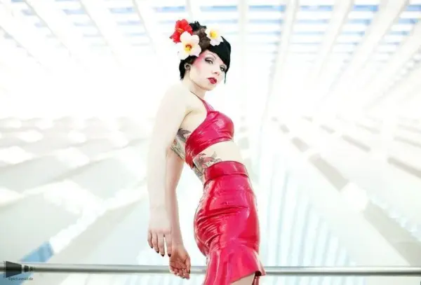 Pearlsheen red latex fishtail skirt with high waist and ruffled hem front view