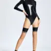 Model wearing black rubber fetish leotard showing high cut legs and optional crotch zipper