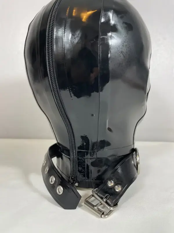 Rear view of sensory deprivation latex hood with back zipper