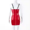 White mannequin wearing strappy rubber fetish dress showing sculpted bustline and vibrant red contrast