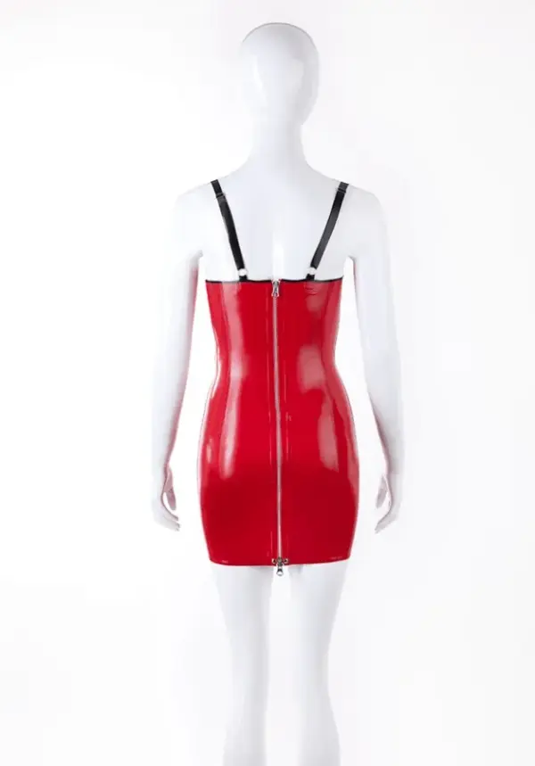 White mannequin wearing strappy rubber fetish dress showing sculpted bustline and vibrant red contrast