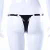 Model wearing provocative crotchless rubber fetish panty showing adjustable dig free hip straps and open front