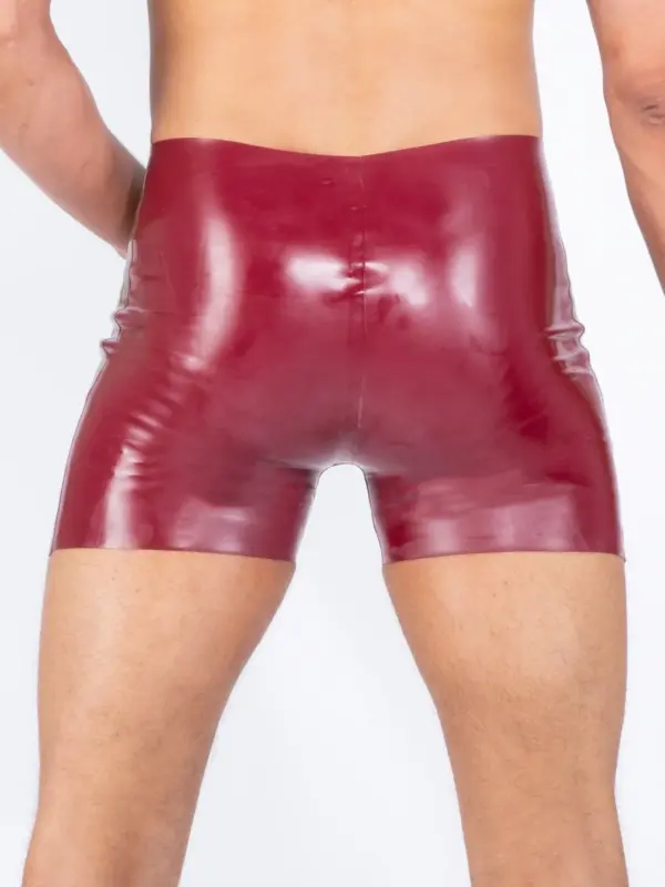 Rear view of mid-thigh latex trunks in plum and gold color
