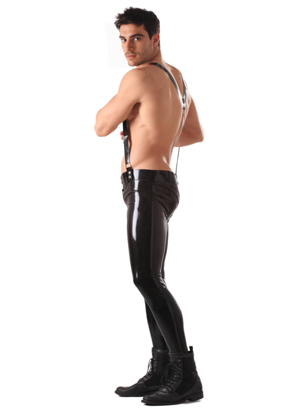 Male model wearing skinny latex trousers with metal hardware details