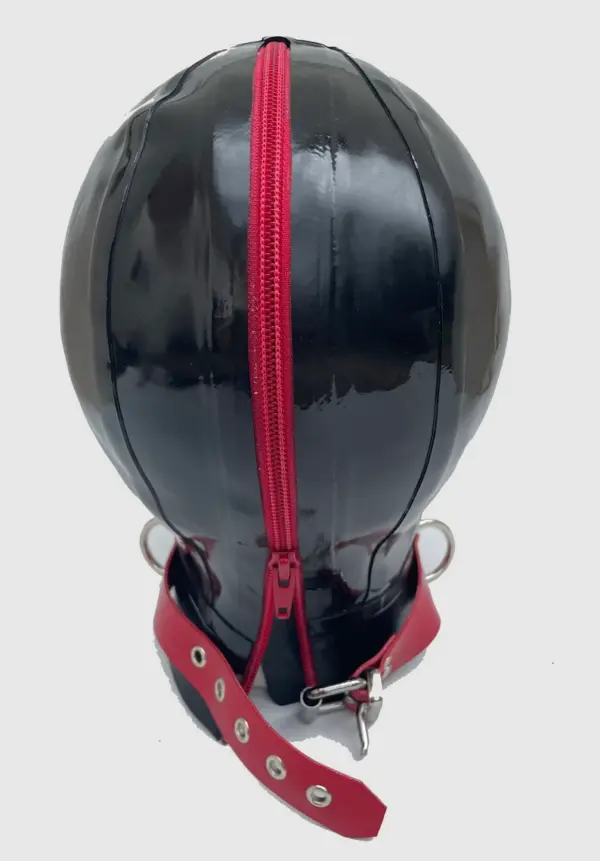 Close up of functional red zipper mouth on black latex hood