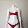 Glossy red latex lingerie set round cup bra and low waist briefs front view