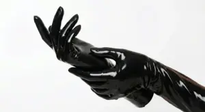 Latex gloves — close-up of black elbow-length latex gloves showing high-gloss mirror finish by LatexLuxe